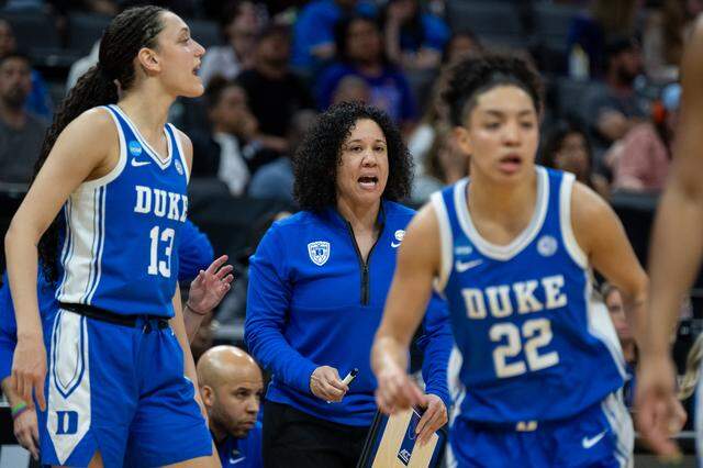 Duke Blue Devils head coach Kara Lawson talks to players during the NCAA Women’s Basketball Tournament Sweet 16 game vs. the Louisiana State University Tigers at Golden 1 Center in Sacramento on Friday.